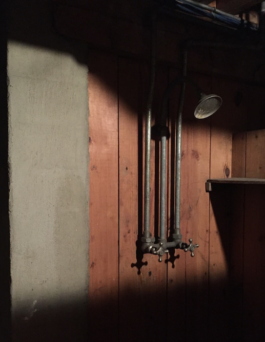 Image of old timey shower in the basement